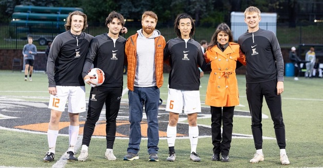 The Kalamazoo men's soccer seniors with their Most Valuable Professors.