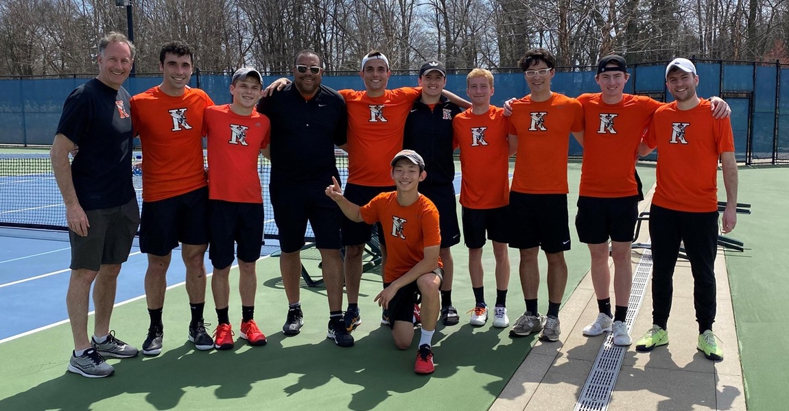 The men's tennis team in a group photo.