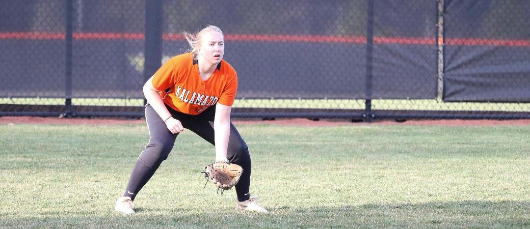 Paige Maguire playing softball.
