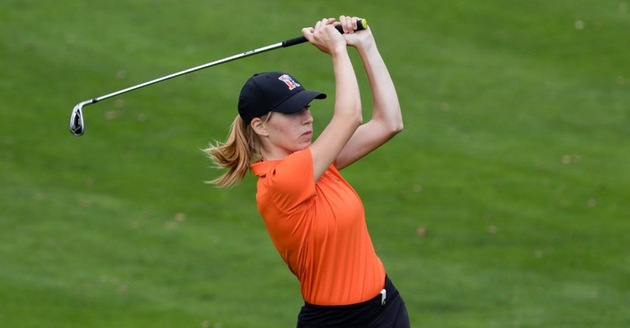 Katherine Stewart playing golf.
