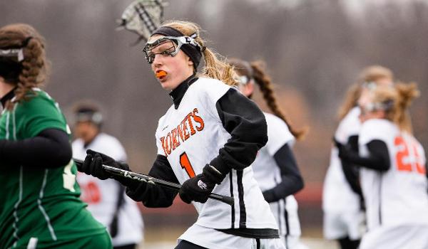 Holly Cooperrider playing lacrosse.