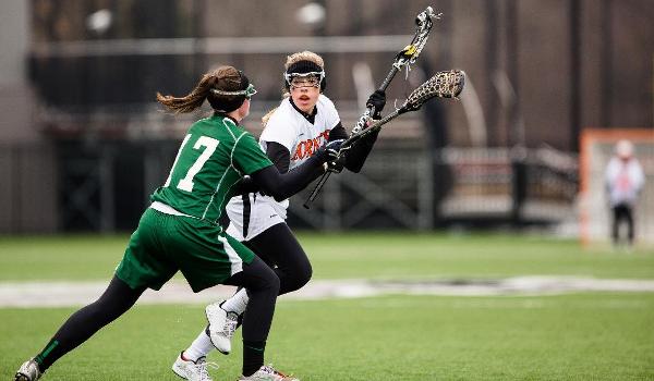 Alivia Duquet playing lacrosse.