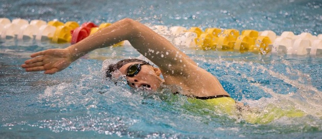 Courtney McGinnis swimming.