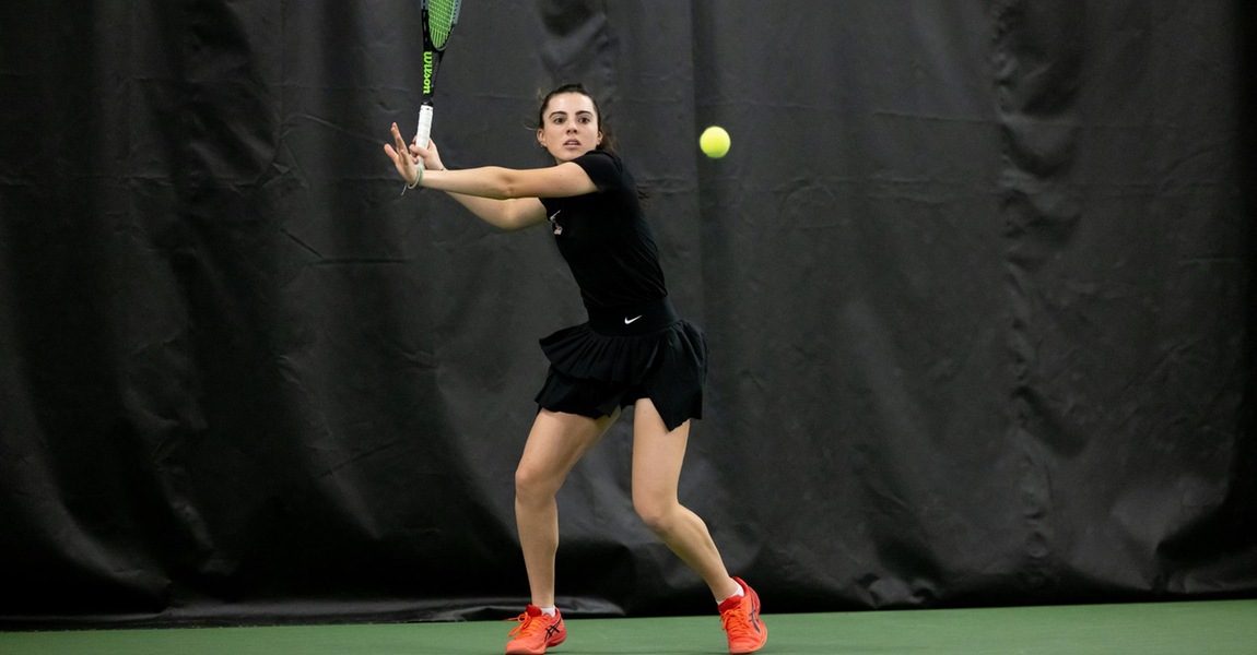 Maddie Hurley playing tennis.