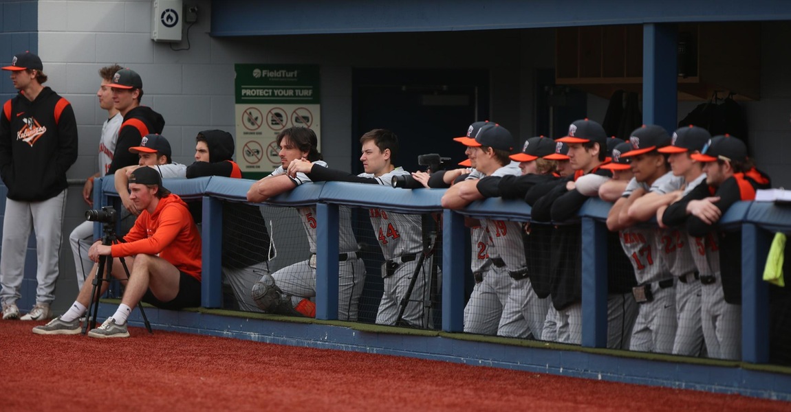 The Kalamazoo College baseball team in the dugout.
