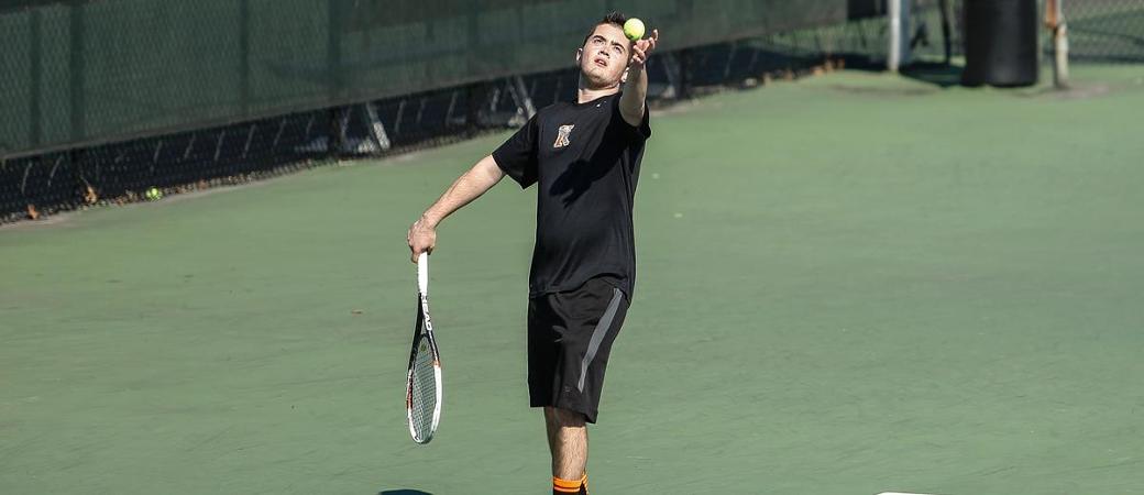 Branden Metzler playing tennis.