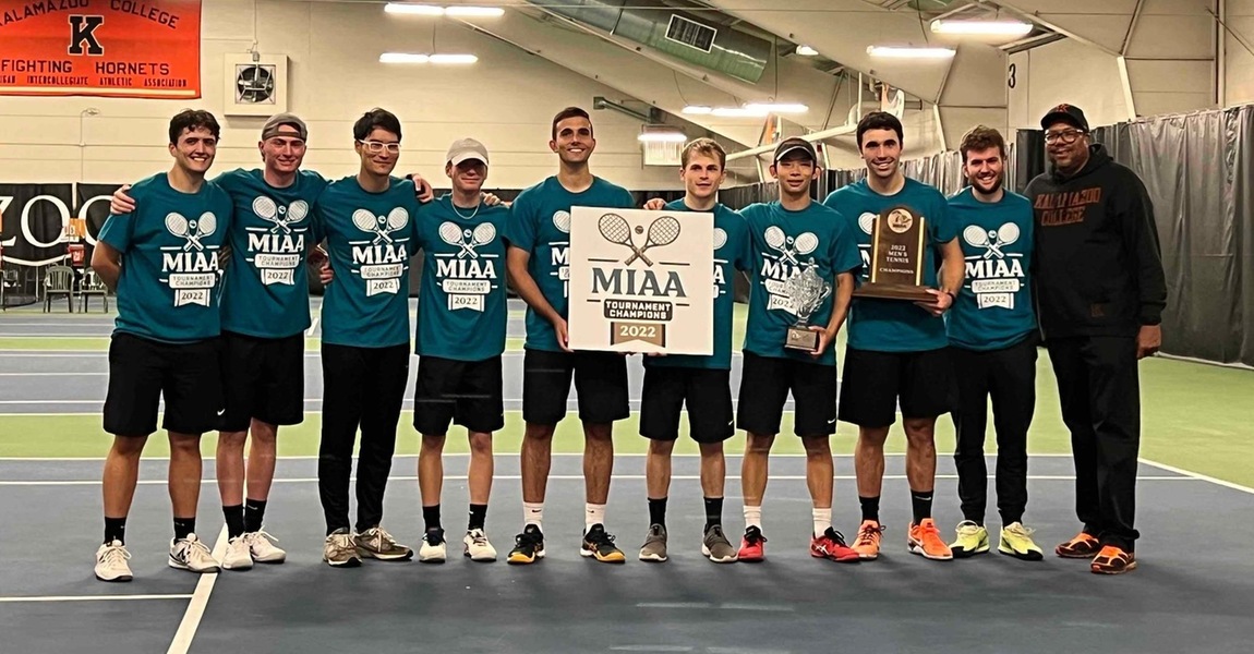The Kalamazoo College men's tennis team with the MIAA Tournament trophy.