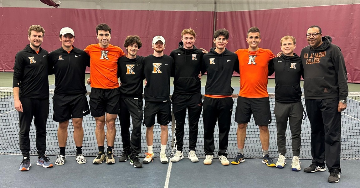 The Kalamazoo College men's tennis team in a group photo after winning the 2023 MIAA championship.