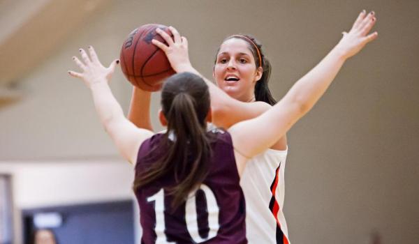 Katherine Johnston playing basketball. 