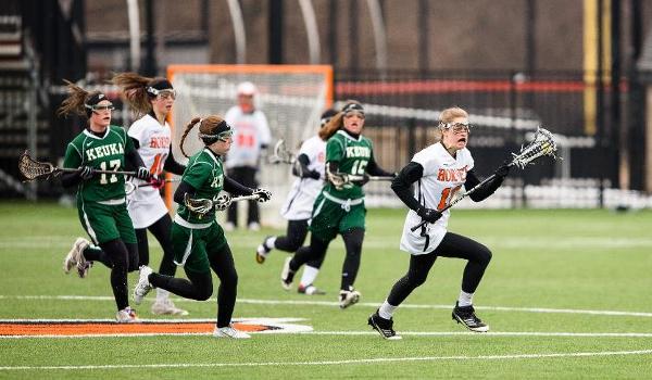 Annika Sproull playing lacrosse.