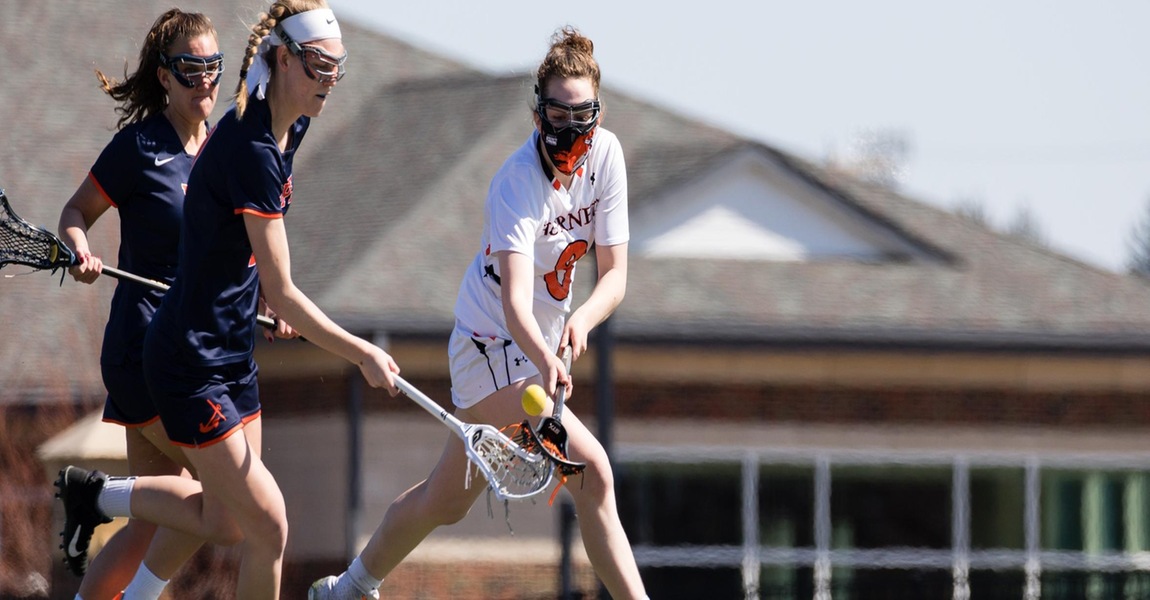 Lilly Baumann playing lacrosse 