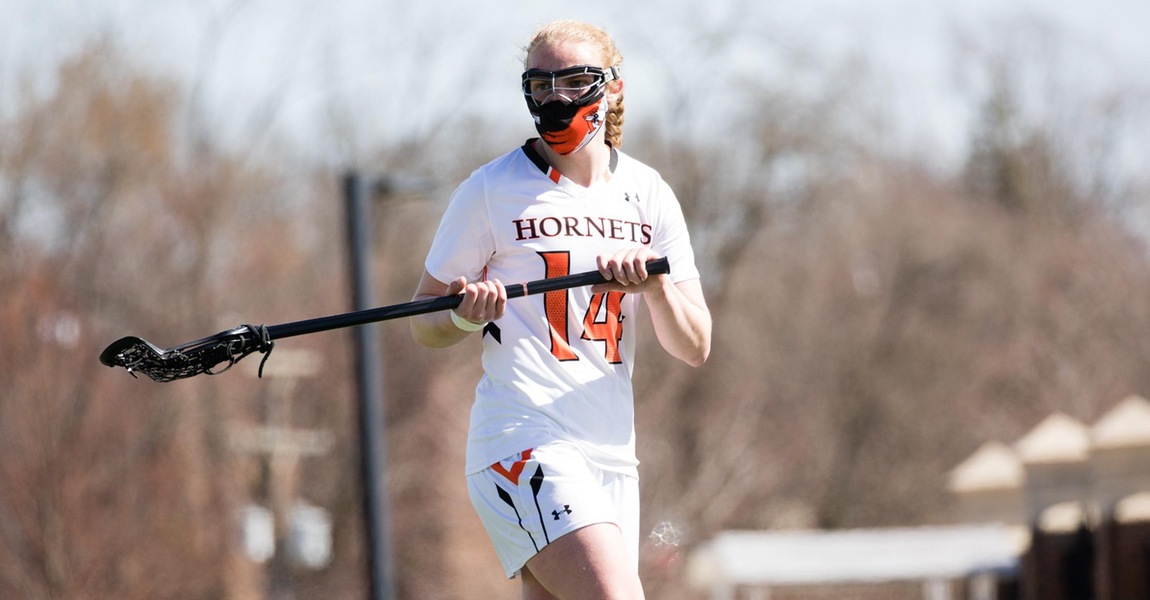 Hannah Wolfe playing lacrosse