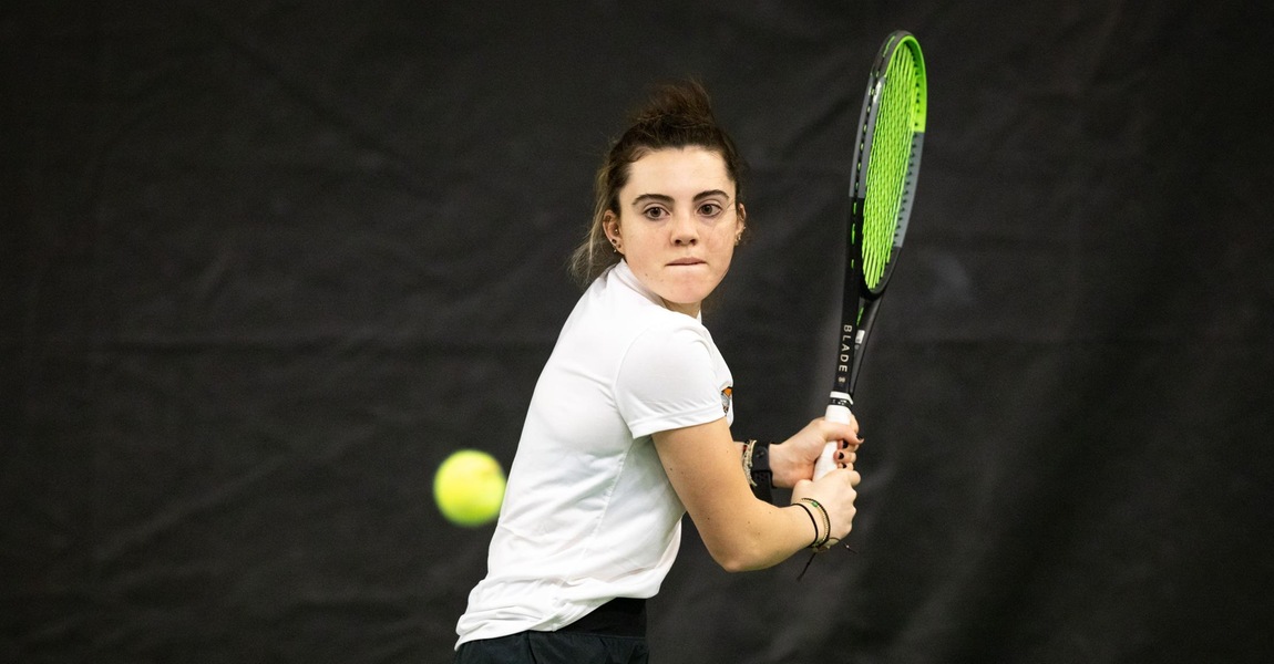 Maddie Hurley playing tennis.