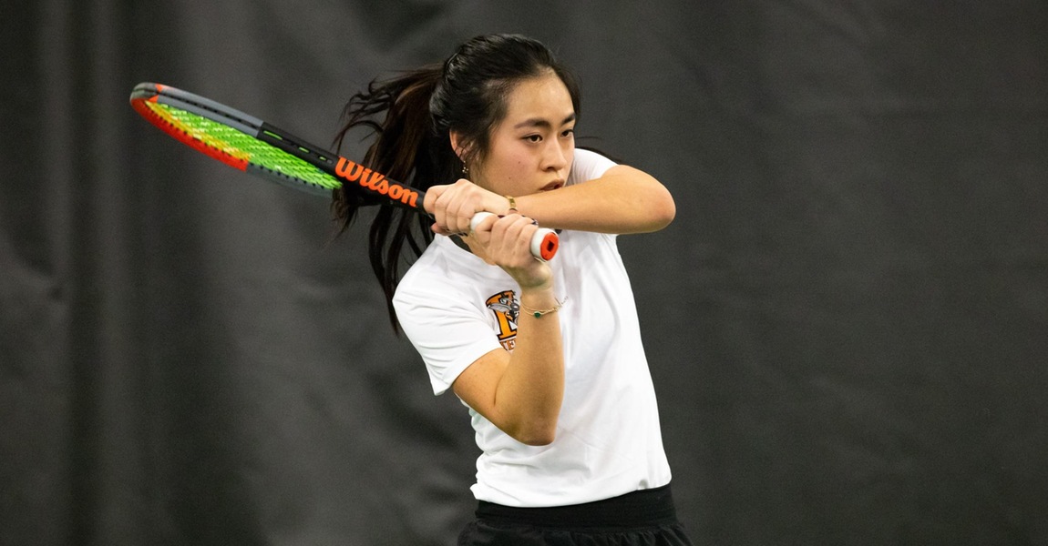 Sophie Zhuang playing tennis.