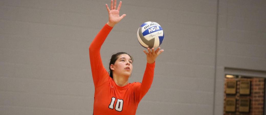 Rachel Girard playing volleyball.